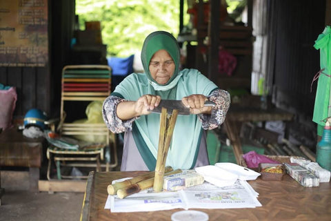 Preparing bamboo tubes for lemang. Photo by Iskandar Al Imran.