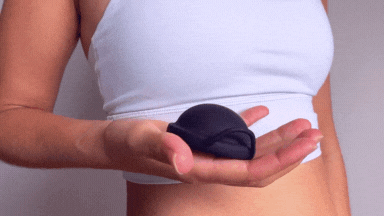The black Hey Zomi reusable menstrual disc