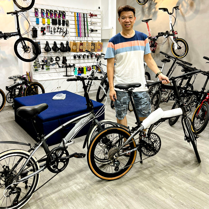 Eco-conscious biker participating in The Bike Atrium's bicycle trade-in program.