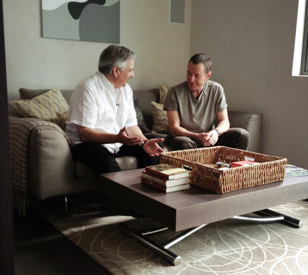 Two men sitting on newly designed home