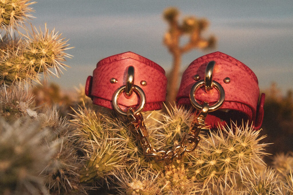 shop handmade leather cuffs in desert rose