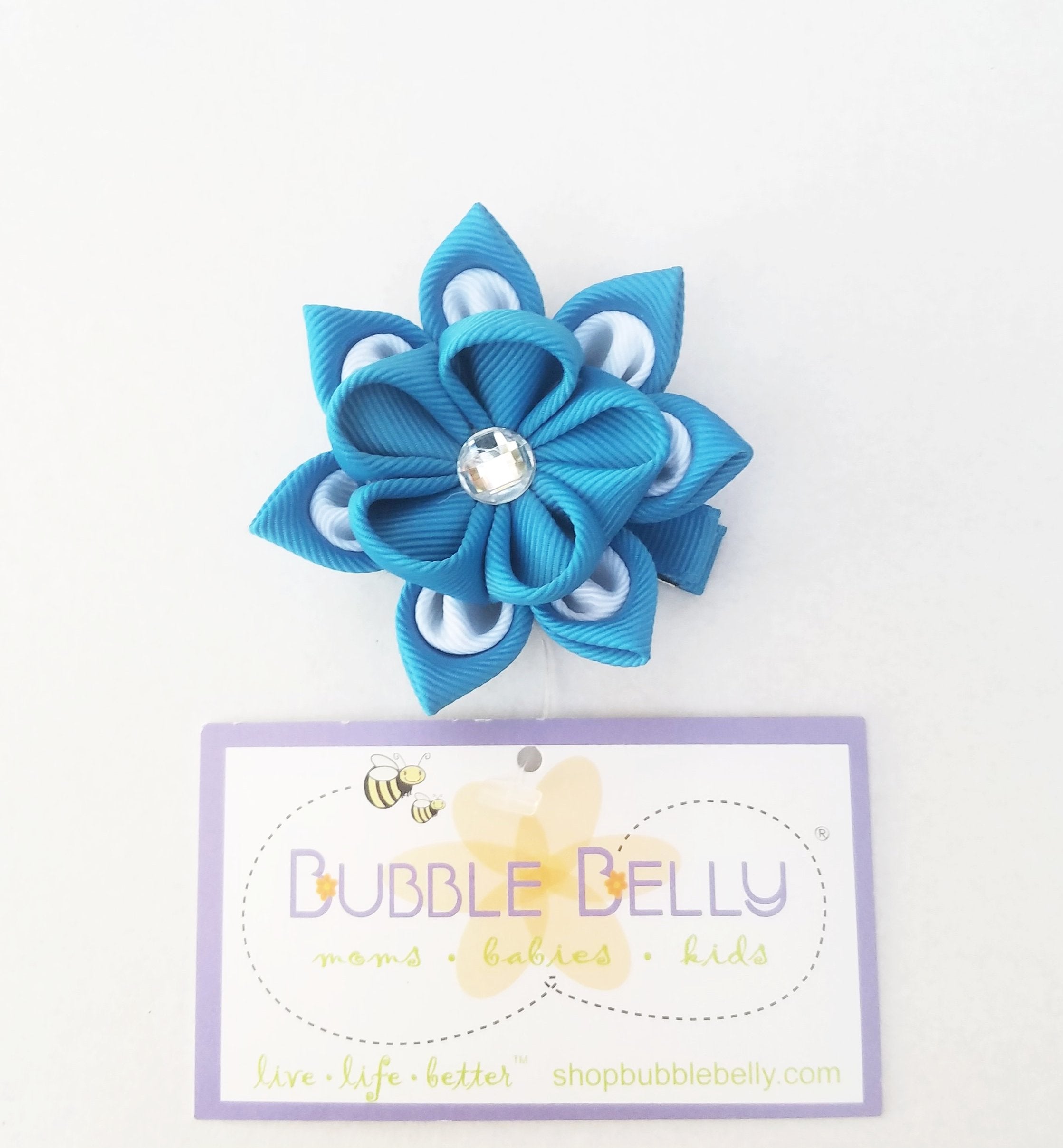 teal flower hair clips