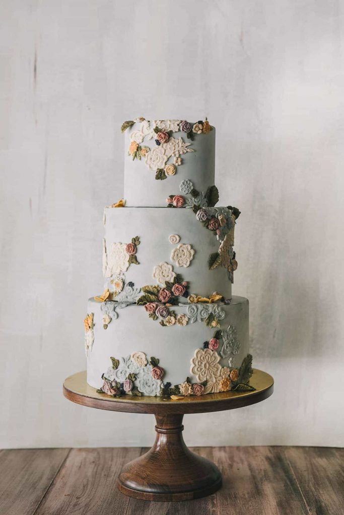 Colourful embroidered flowers wedding cake