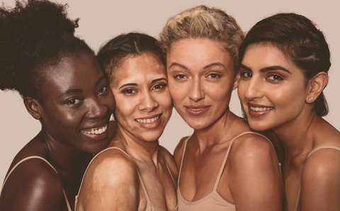 Group of women of different ethnicities smiling