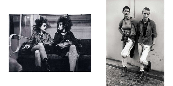 A collage of two black and white photos. Left image of two young white woman with dark spiked up hair and wearing studded leather jackets and fishnet tights. Right image of two young white women standing against a wall, both with one foot up against it. They wear matching white jeans, polo collared shirts and have shaved hair.