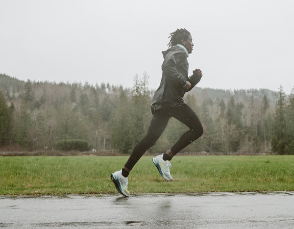 Runner in mid stride in rain