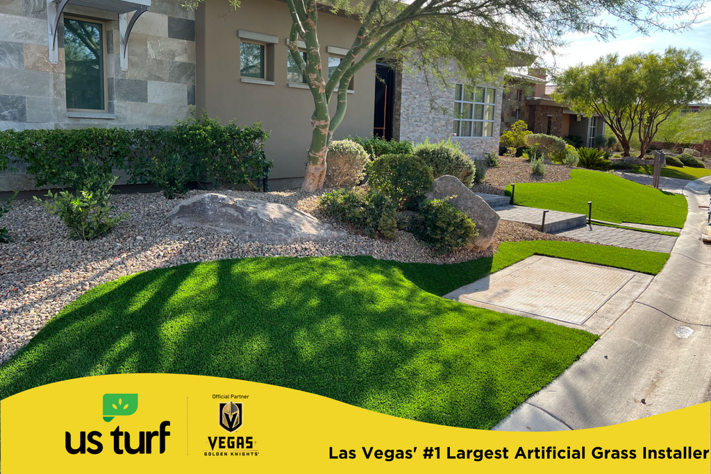 artificial grass in the front yard of a residential house with desert landscaping