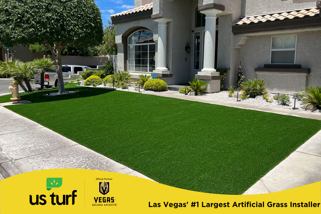 big front yard with artificial turf in front of a large house
