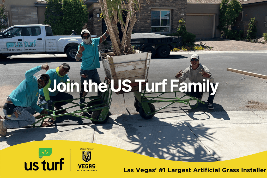 3 workers in blue us turf t-shirts standing next to a palm tree on the street