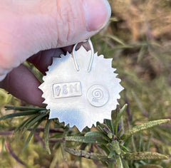 Image of the back of sterling silver mandala pendant