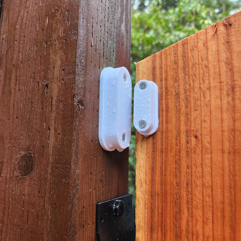 Aqara door and window sensor being used on an outdoor fence gate using a weatherproof enclosure