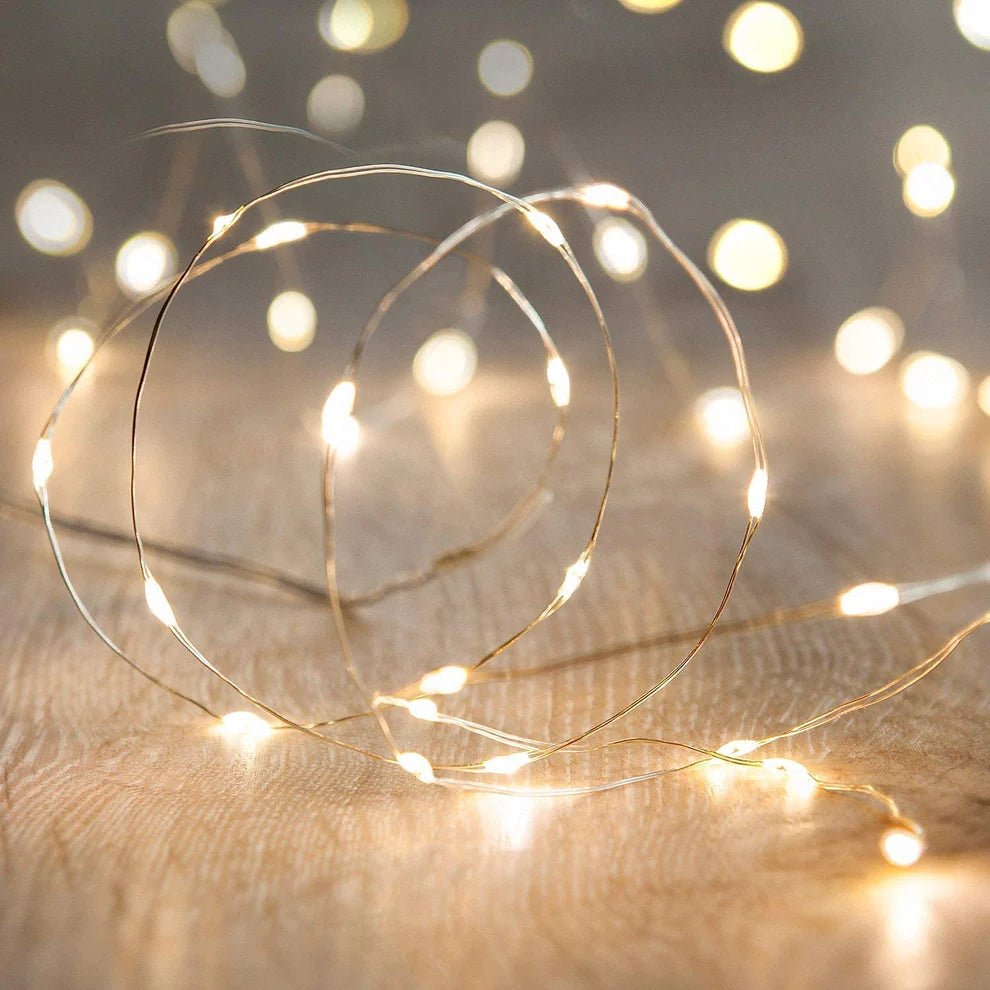 Dorm decor items including wall art, string lights, and cozy accessories to personalize and brighten a student’s living space.