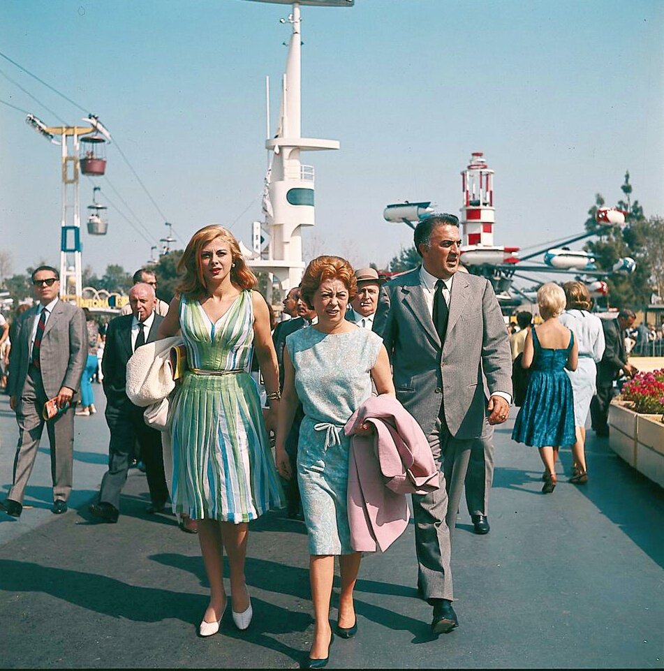 Federico Fellini, Giulietta Masina, Sandra Milo at Disneyland, 1964.