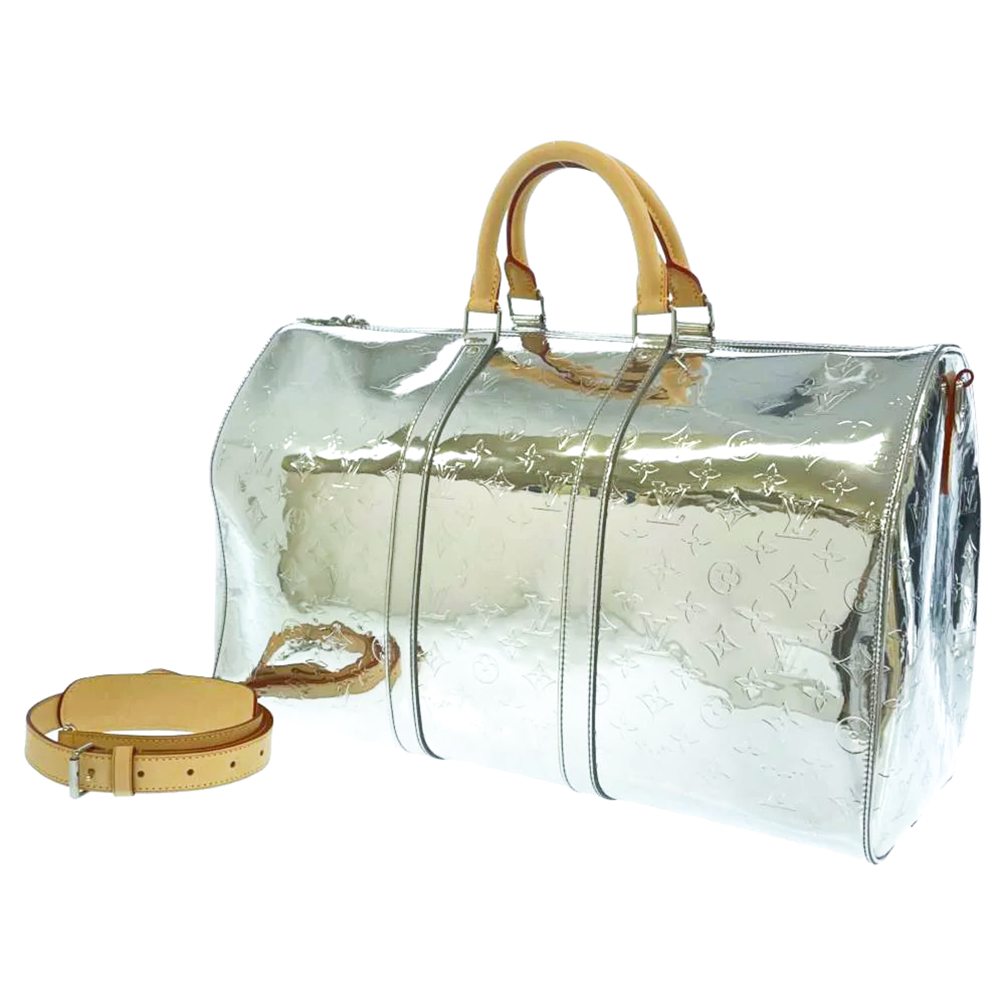 Keepall travel bag Louis Vuitton Silver in Plastic - 23637989