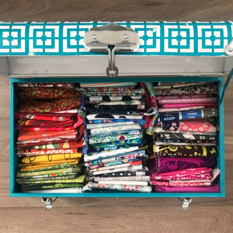 Metal trunk filled with fat quarters 
