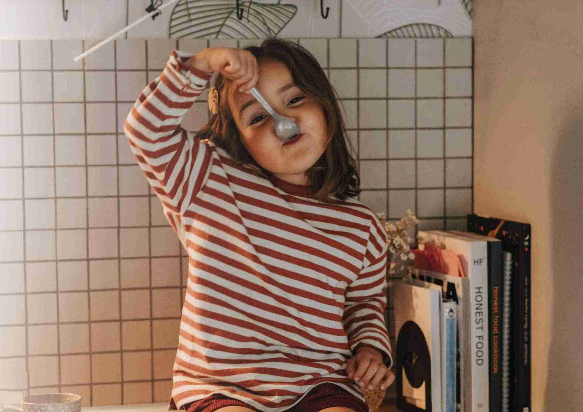 little girl eating organic food