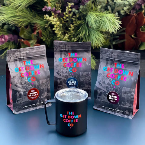 This sampler pack by The Get Down Coffee Co. includes one 12oz bag each of each of their signature blends including Drip Drip, Turntables and Plus One.