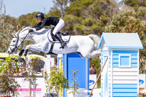 Ally Gostelow over the open water jump at the Australian Showjumping Championships
