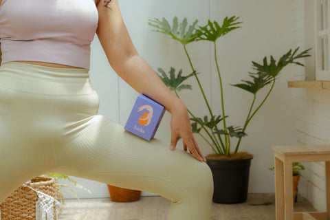 woman holding a box of organic pads