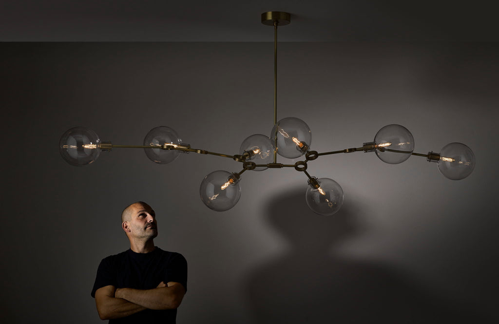 Designer Peter Straka and ORA 8 Chandelier