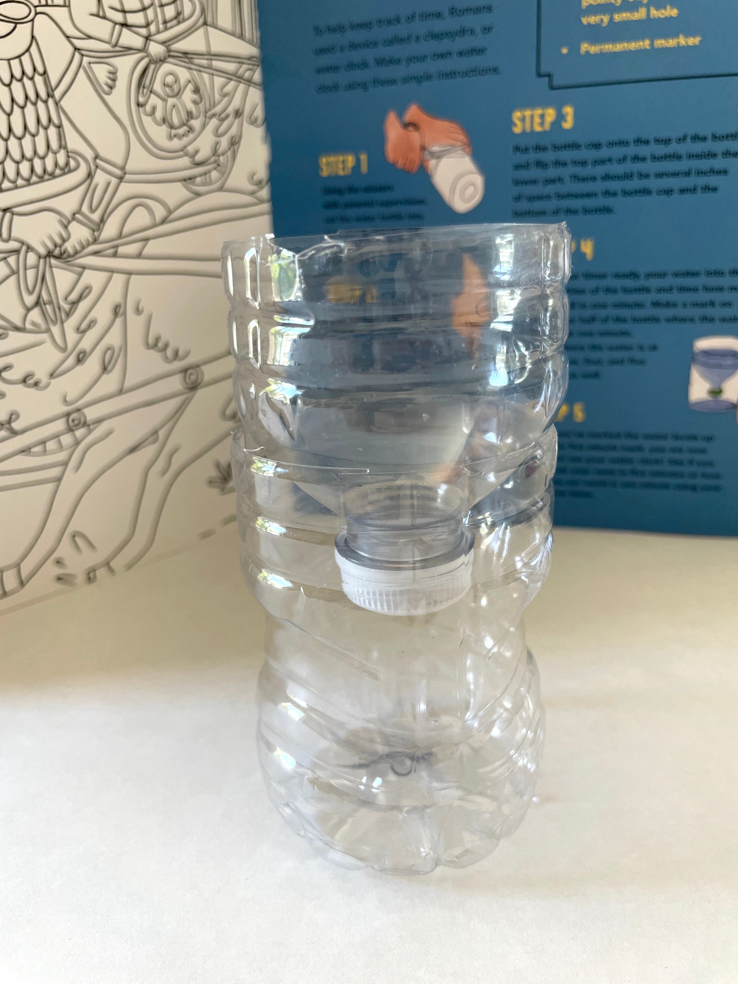 Plastic water bottle cut in half