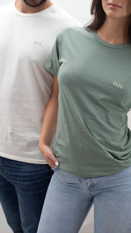 Two models display t-shirts with 1111 and 222 on them