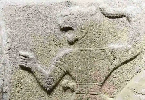Ancient frieze of a Lyran in battle