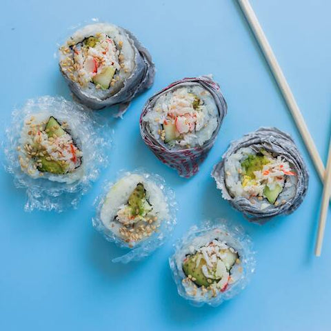 Sushi rolls with plastic bubblewrap instead of seaweed representing microplastics in food