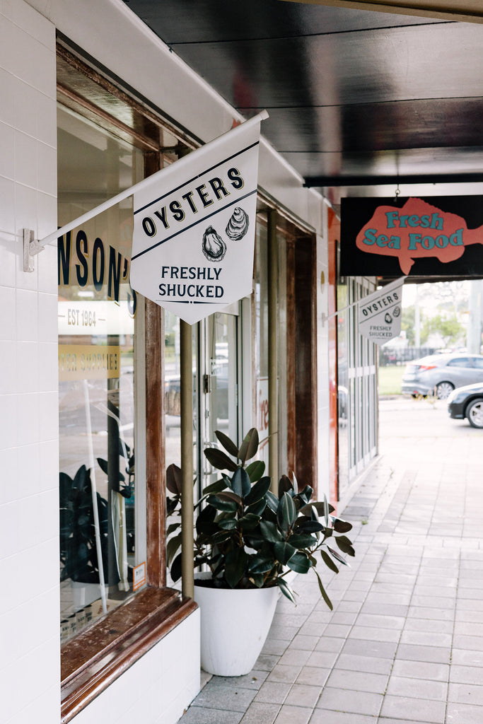 Exterior of Dawson's Oyster Supplies store front in Warners Bay, Lake Macquarie