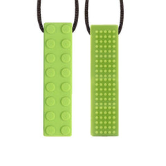 green block chew necklace showing the building block toy like front and the textured bumps on the back
