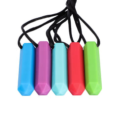 prism pendant chew necklaces in a row from blue, purple, light blue, red, and green