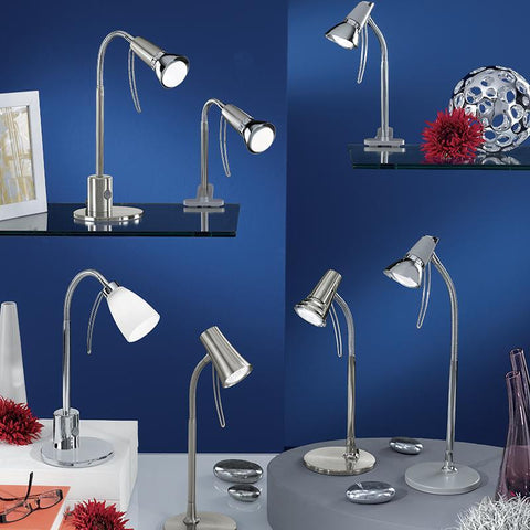 An array of table lamps, placed on shelves.