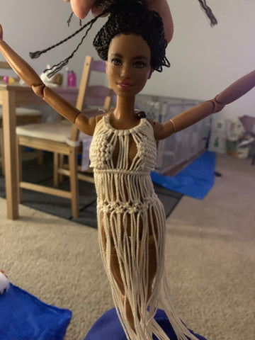 Working the macrame knots while draped on the doll.