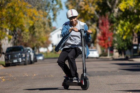 Teen riding Hoverfly F1 Electric Scooter for Teens