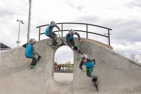 Kid riding a concrete arch at a Skatepark on a GOTRAX ST PRO 300 Stunt Scooter