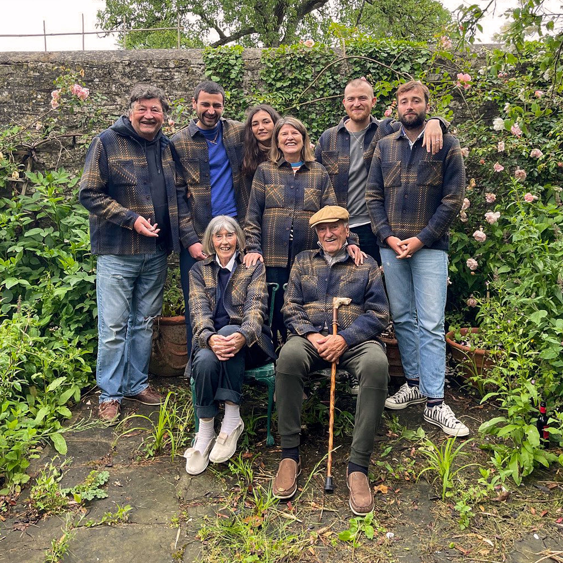 Wax London founder Tom's family wearing Whiting Overshirts in a garden setting