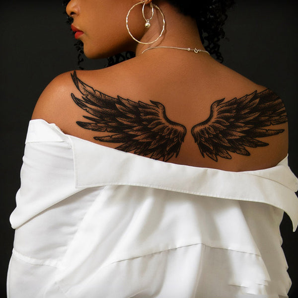 blessed tattoos with wings