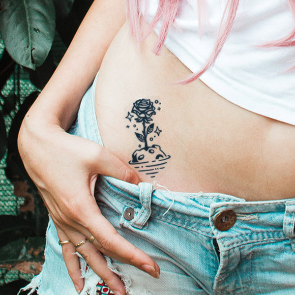 rose belly button tattoos