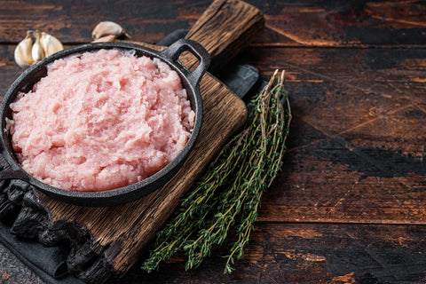 ground chicken in iron skillet