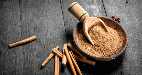 grounded cinnamon in a mortar and pestle