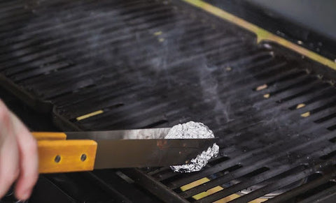 cleaning grill with aluminum foil ball