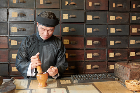 chef using mortar and pestle