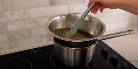 mix carefully wax with oils