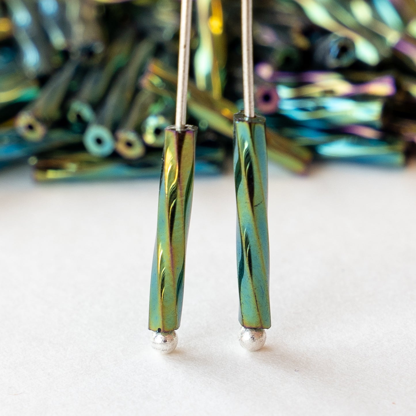 15mm Twisted Bugle Beads - Transparent Emerald Green Iris - 200 Beads –  funkyprettybeads
