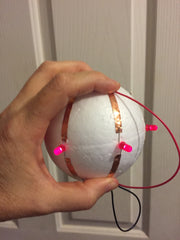 Foam ball with tape and lights