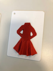 Dress made in tactile material on a card