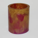 Pink and gold resin pot