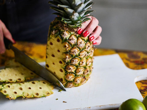 Peeling the pineapple 