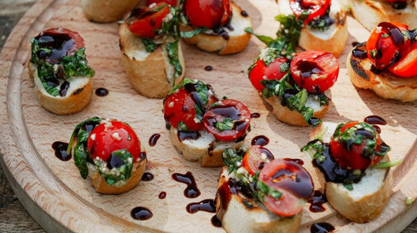 plate of mouthwatering tomato bruschetta is completed