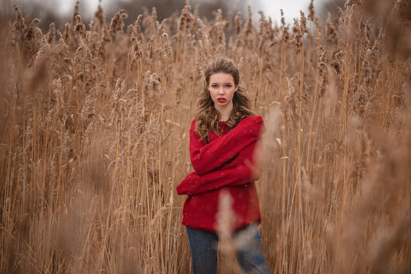 a bright colored knitted jumper